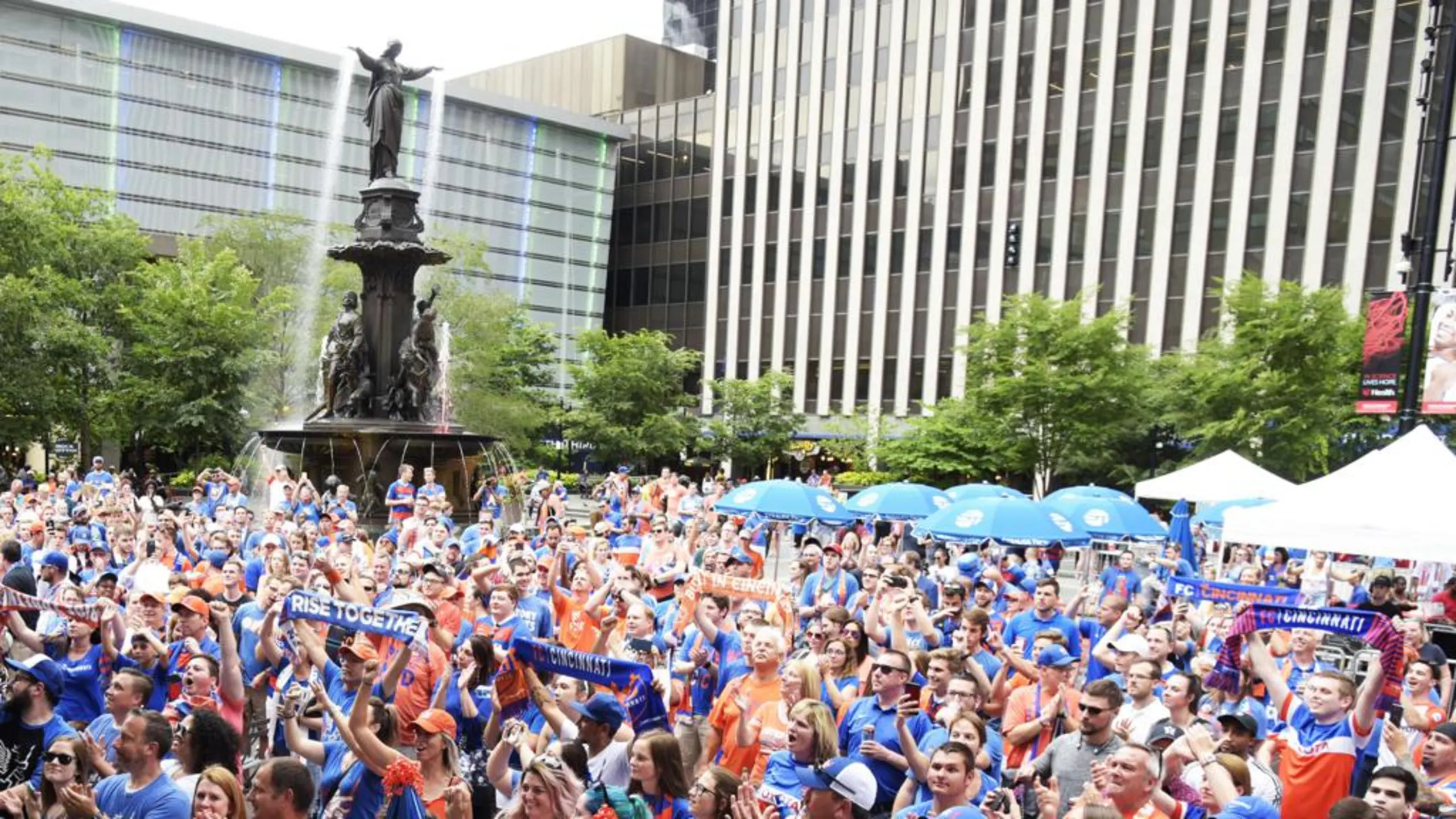 Crowd of FC Cincinnati fans at a Fountain Square watch party in downtown Cincinnati